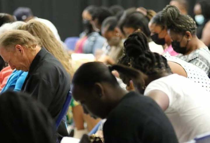 Church praying together