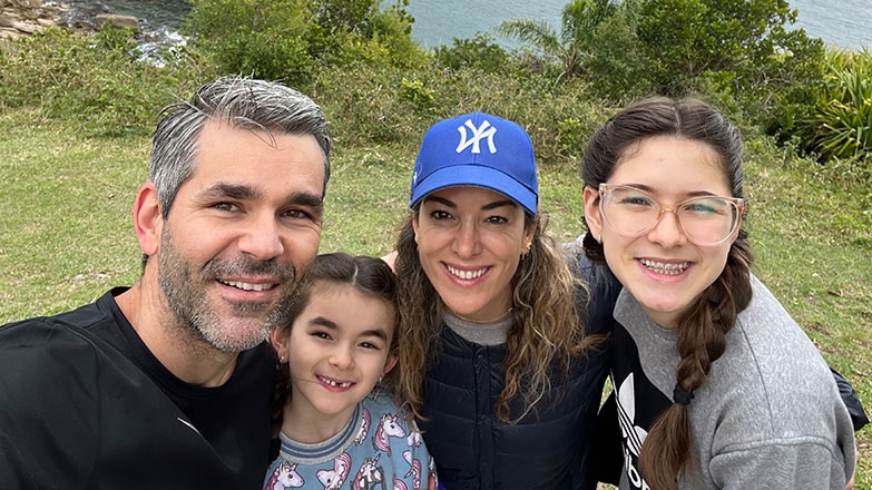 Smiling family of four