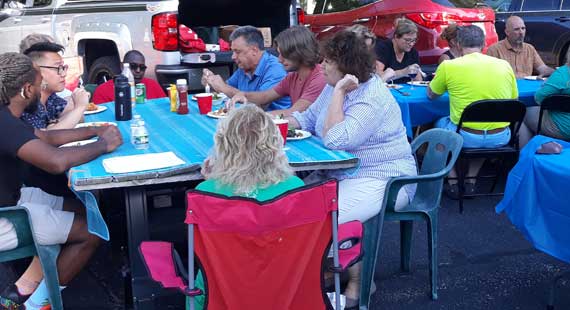 Group of people eating outside