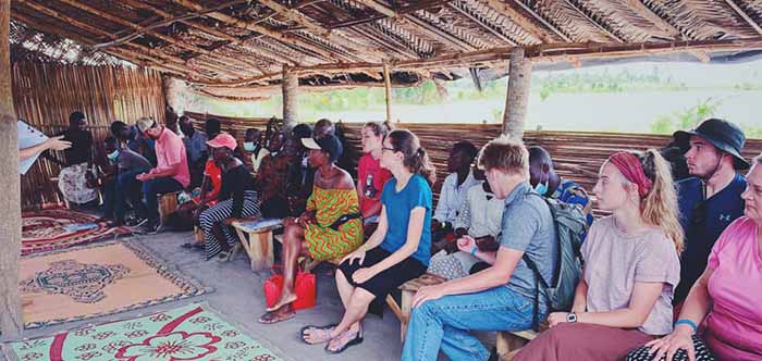 Interns in group session at village camp