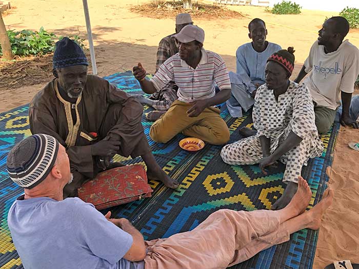 Men sitting and talking