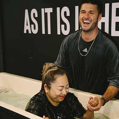 Mother getting baptized