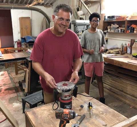 Man working with router